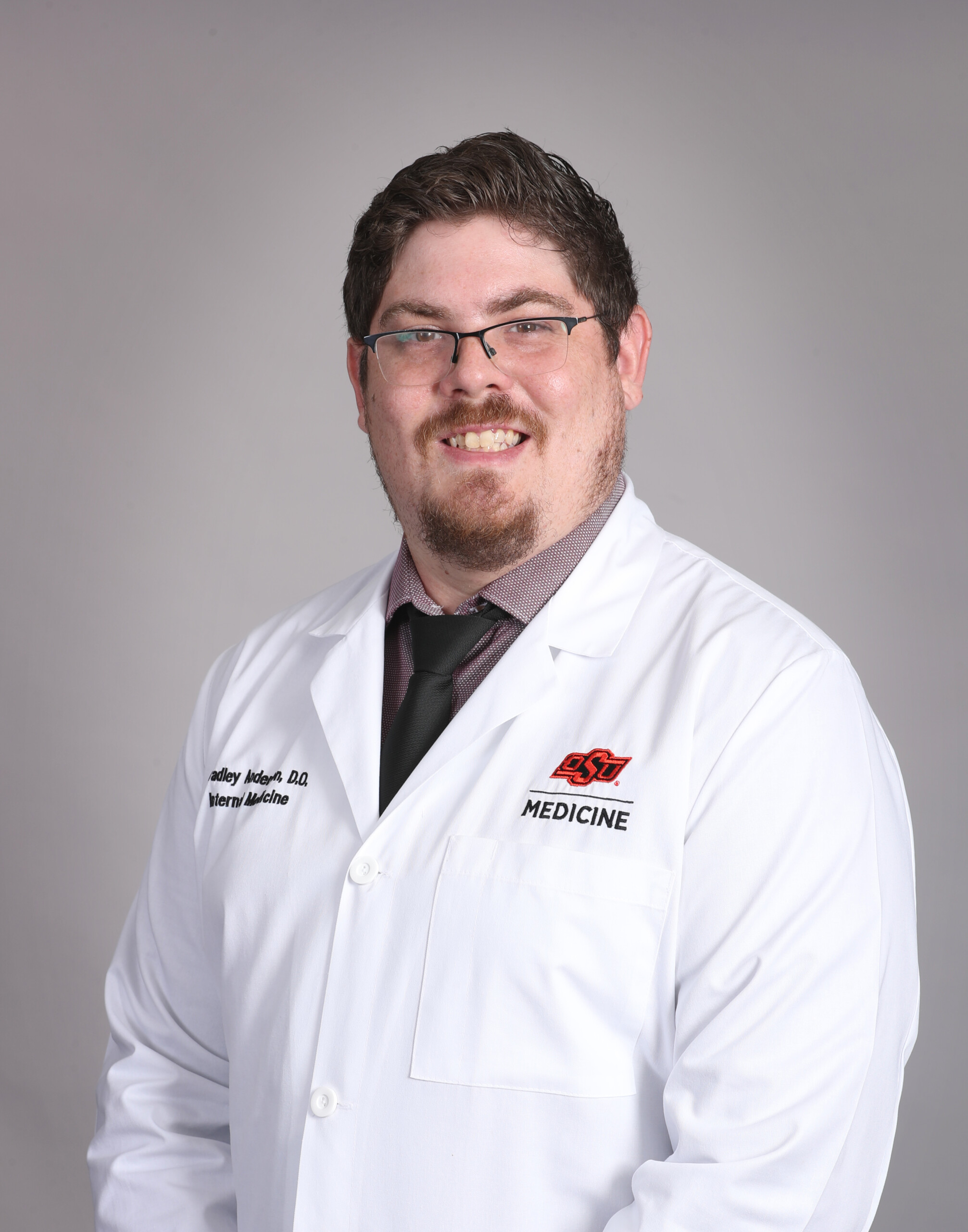 Headshot of Dr. Bradley W. Anderson in a whitecoat
